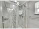 Shower with glass enclosure and tiled walls at 1743 Council Dr, Sun City Center, FL 33573