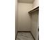 Large walk-in closet with overhead shelving at 6812 Woodsman Dr, Wesley Chapel, FL 33544