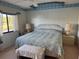Bright bedroom with a king-size bed and water view at 1873 Mazo Mnr # T2, Lutz, FL 33558