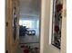 View through entry door into living room at 1873 Mazo Mnr # T2, Lutz, FL 33558
