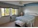Large bedroom with water view and ceiling fan at 1873 Mazo Mnr # T2, Lutz, FL 33558