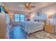 Main bedroom with ocean view and hardwood floors at 900 Gulf Blvd # 205, Indian Rocks Beach, FL 33785