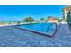 Inviting community pool with lounge chairs at 900 Gulf Blvd # 205, Indian Rocks Beach, FL 33785