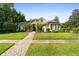 Exterior of a charming single-story home with a brick walkway at 918 Shoals Landing Dr, Brandon, FL 33511
