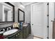 Bathroom with double vanity and granite countertop at 918 Shoals Landing Dr, Brandon, FL 33511