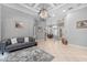 Living room with gray couch and view to dining area at 918 Shoals Landing Dr, Brandon, FL 33511