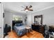 Bedroom with bed, dresser, and ceiling fan at 918 Shoals Landing Dr, Brandon, FL 33511