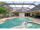 Spacious screened pool and spa with paver deck at 918 Shoals Landing Dr, Brandon, FL 33511