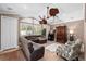 Gathering room with sectional sofa, and large ceiling fan at 918 Shoals Landing Dr, Brandon, FL 33511