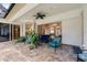 Covered patio with seating area and views of the pool at 918 Shoals Landing Dr, Brandon, FL 33511