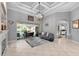 Spacious living room with fireplace and sliding doors to the pool at 918 Shoals Landing Dr, Brandon, FL 33511