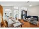 Open concept dining area with yellow chairs and a view of the living room and kitchen at 22834 Roderick Dr, Land O Lakes, FL 34639