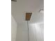 Garage ceiling with an access door and a pull-down staircase for storage above at 4817 Majestic Hills Loop, Brooksville, FL 34601