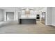 Open concept kitchen with an island and stainless steel appliances at 4817 Majestic Hills Loop, Brooksville, FL 34601
