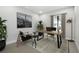 Modern home office with stylish furniture, decor, and a bright window for natural light at 4817 Majestic Hills Loop, Brooksville, FL 34601