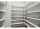 Large walk-in pantry with ample shelving at 4817 Majestic Hills Loop, Brooksville, FL 34601