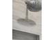 Close-up of a modern shower head with sleek lines and chrome finish at 4817 Majestic Hills Loop, Brooksville, FL 34601