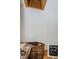 A laundry chute with a basket and a chalkboard is shown in the image at 5455 Lake Le Clare Rd, Lutz, FL 33558