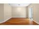 Bright dining room with hardwood floors and modern chandelier at 11516 Bellamar St, Temple Terrace, FL 33637