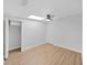 Well-lit bedroom with wood floors and large closet at 1155 7Th N St, Safety Harbor, FL 34695