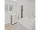 Laundry room featuring modern appliances including a washer and dryer at 1155 7Th N St, Safety Harbor, FL 34695