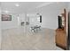 Bright living room with tile floors, open layout, and a decorative fireplace offering a spacious and welcoming atmosphere at 1155 7Th N St, Safety Harbor, FL 34695