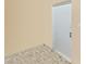 Mud Room area with white door and floral-patterned floor at 1155 7Th N St, Safety Harbor, FL 34695