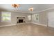 Bright living room with fireplace and tile floors at 1364 S Evergreen Ave, Clearwater, FL 33756