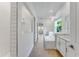 Spacious bathroom featuring dual vanities, a soaking tub, and a walk-in shower at 4638 Southern Valley Loop, Brooksville, FL 34601