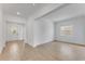 Bright living room with wood-look tile floors and plenty of natural light at 4638 Southern Valley Loop, Brooksville, FL 34601