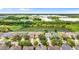 Aerial view showcasing the home's location with serene water views and community amenities nearby at 7127 Forest Mere Dr, Riverview, FL 33578
