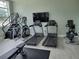 Well-equipped gym with treadmills, stair climbers, and other exercise machines at 7127 Forest Mere Dr, Riverview, FL 33578