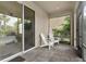 An inviting outdoor patio features brick floors and comfortable seating to enjoy the lush backyard views at 7127 Forest Mere Dr, Riverview, FL 33578
