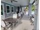 A well-appointed pool deck includes ample seating, providing an ideal spot for relaxation and socializing by the pool at 7127 Forest Mere Dr, Riverview, FL 33578