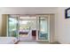 Private balcony with outdoor furniture, overlooking scenic water views at 9550 Tara Cay Ct # 17, Seminole, FL 33776