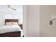 Bathroom with shower and view into bedroom at 9550 Tara Cay Ct # 17, Seminole, FL 33776