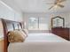 Spacious main bedroom with large bed and dresser at 9550 Tara Cay Ct # 17, Seminole, FL 33776