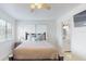 Bedroom with ensuite bathroom and a double bed at 9550 Tara Cay Ct # 17, Seminole, FL 33776