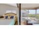 Bedroom with access to a private balcony at 9550 Tara Cay Ct # 17, Seminole, FL 33776