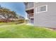 Side view of building exterior and landscaping at 9550 Tara Cay Ct # 17, Seminole, FL 33776