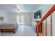Main bedroom with king bed, dresser, and access to the patio at 9550 Tara Cay Ct # 17, Seminole, FL 33776