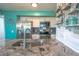 Kitchen features granite countertops and stainless steel appliances at 5722 Biscayne Ct # 203, New Port Richey, FL 34652