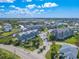 Wide view of condo building and surrounding area at 5722 Biscayne Ct # 203, New Port Richey, FL 34652