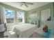 Bedroom with water views and a comfortable bed at 5722 Biscayne Ct # 203, New Port Richey, FL 34652