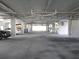 Secure parking garage with extra storage space at 5722 Biscayne Ct # 203, New Port Richey, FL 34652
