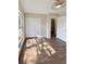 Bedroom with new wood floors, closet, window, and walk in closet at 26933 Carmen Pl, Lutz, FL 33559