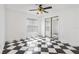 Bedroom with checkered floor and mirrored closet at 2989 Brookfield Ln, Clearwater, FL 33761