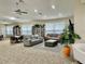 Community room with comfortable seating and extensive library at 2989 Brookfield Ln, Clearwater, FL 33761