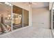Bright enclosed patio with checkered floor and sliding glass doors at 2989 Brookfield Ln, Clearwater, FL 33761