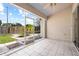 Screened porch overlooking backyard at 2989 Brookfield Ln, Clearwater, FL 33761
